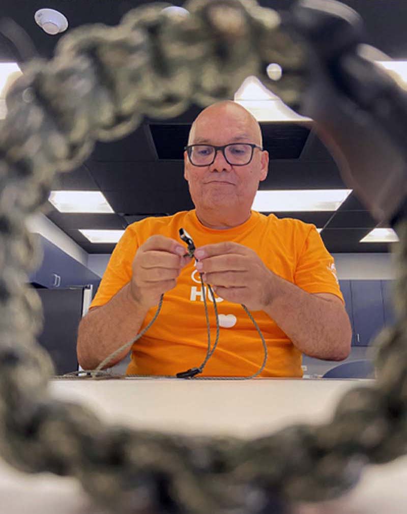 Jay assembling paracord bracelet